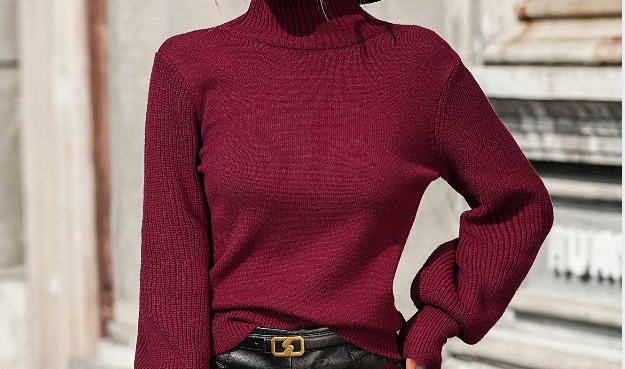 Pullover women's knitted sweater with high collar and studded beads
