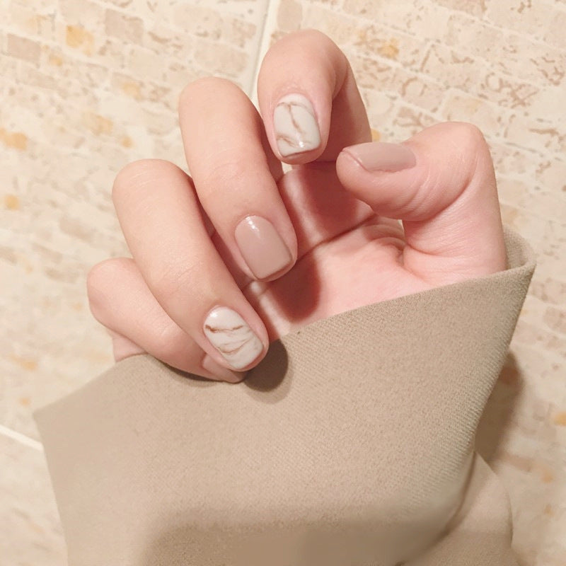 Light khaki smudge false nails