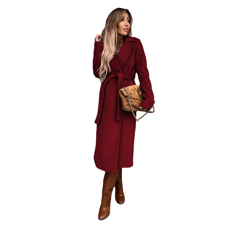 women's solid color lapel long sleeved woolen jacket with simple strap windbreaker