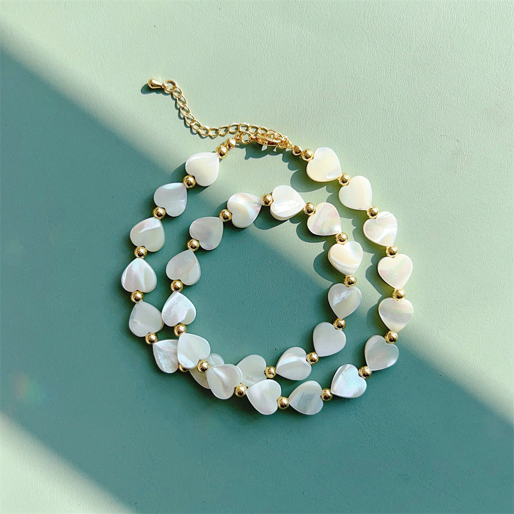 Radiate with Elegance: Natural Deep Sea Shell Love Star Beads Necklace