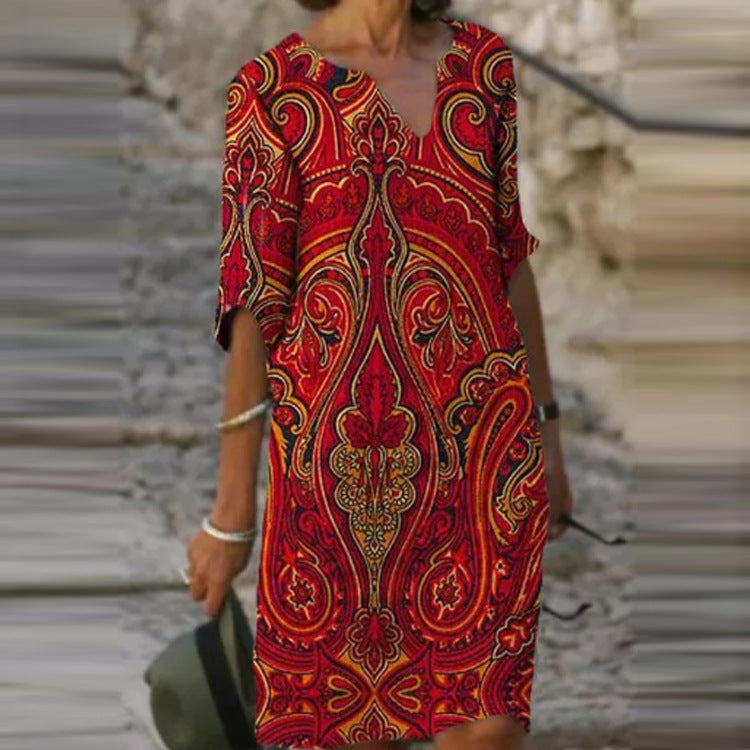 Long Sleeve Women's Dress with a Multicolor Printed Skirt.