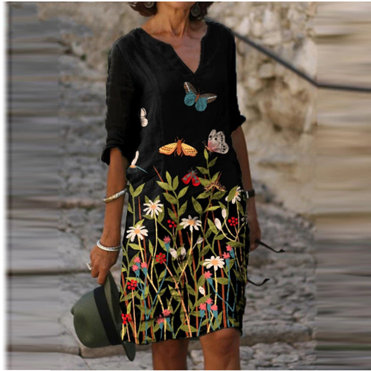 Long Sleeve Women's Dress with a Multicolor Printed Skirt.