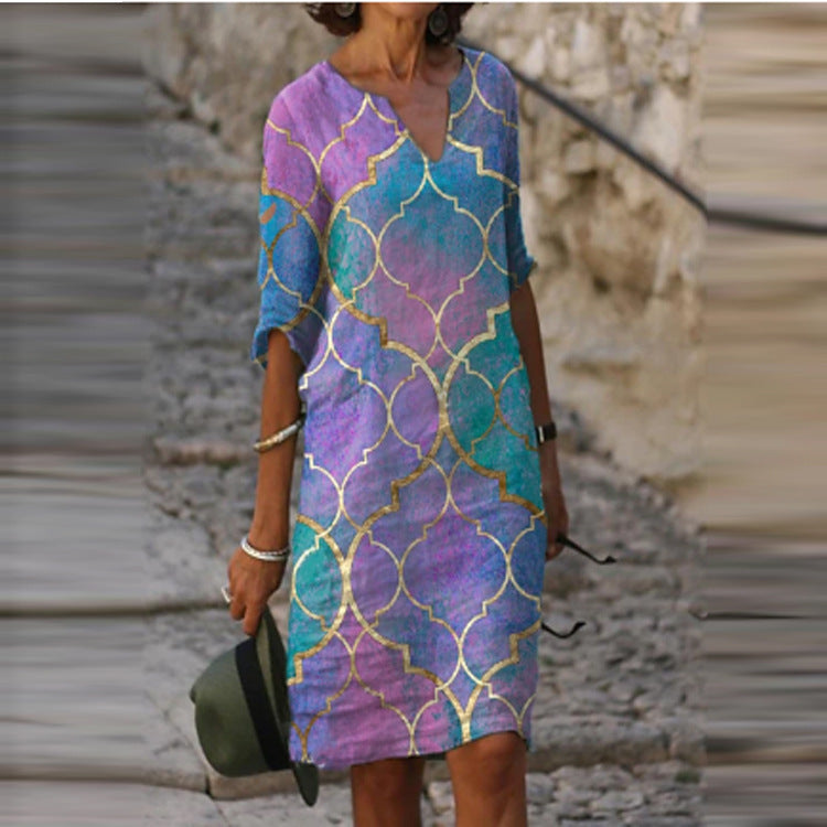 Long Sleeve Women's Dress with a Multicolor Printed Skirt.