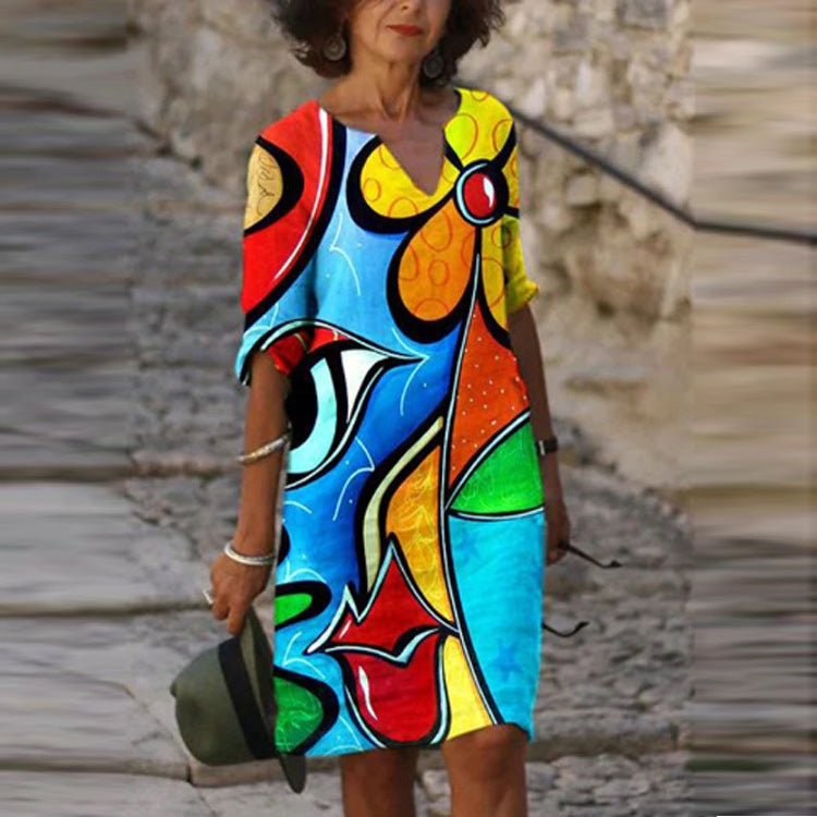 Long Sleeve Women's Dress with a Multicolor Printed Skirt.