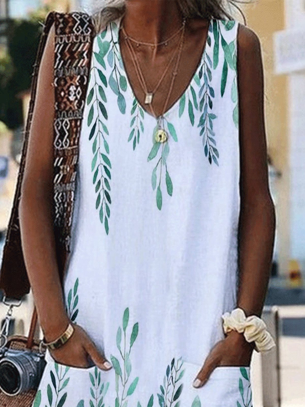 Sleeveless Leaf Print Dress with a V-Neck