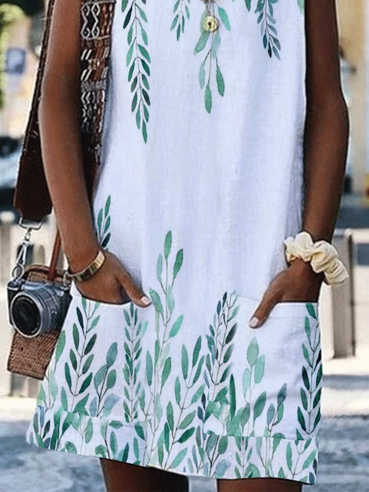 Sleeveless Leaf Print Dress with a V-Neck