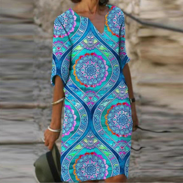Long Sleeve Women's Dress with a Multicolor Printed Skirt.