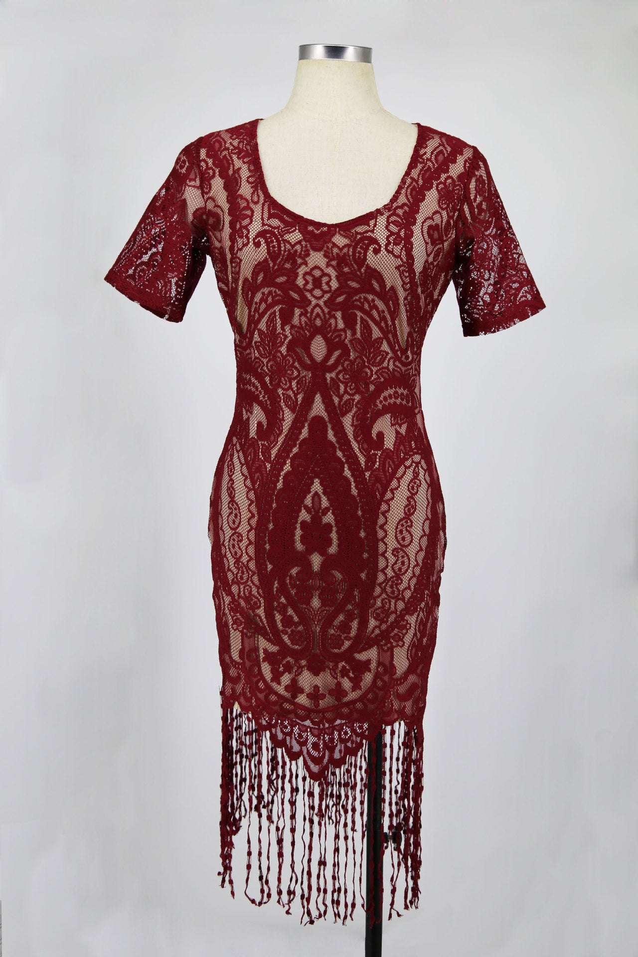 Sheath Dress with V-Neck, Short Sleeves, and Tassel Hem for a Stylish Look.