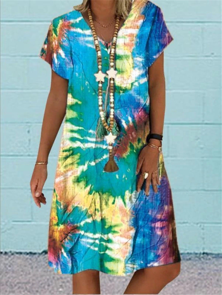 Short-Sleeved V-Neck Dress with a Multi-Color Print.