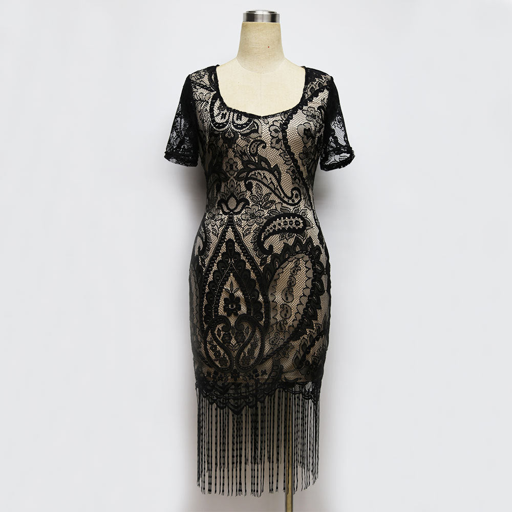 Sheath Dress with V-Neck, Short Sleeves, and Tassel Hem for a Stylish Look.