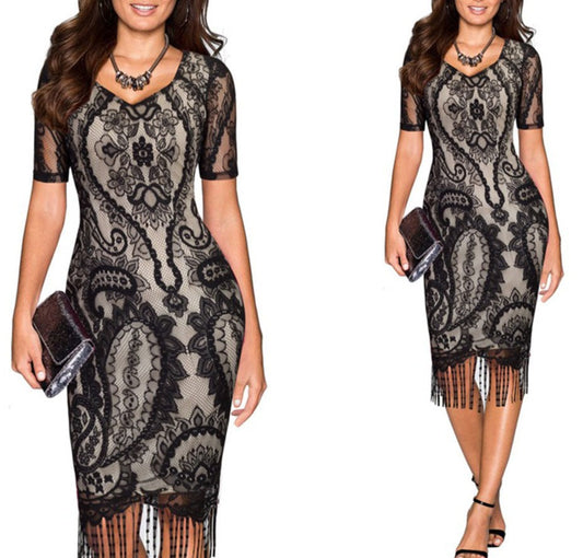 Sheath Dress with V-Neck, Short Sleeves, and Tassel Hem for a Stylish Look.